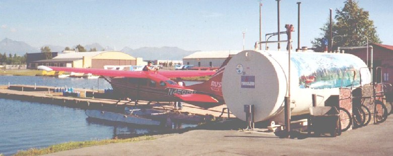 Refuelling the Cessna 206 before our flight.